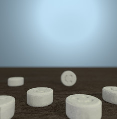 MDMA tablets (ecstasy) seen close-up on a woden surface.  3D Rendering.