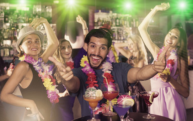 Man dancing on hawaiian party