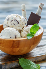 Homemade vanilla ice cream with chocolate crumbs.