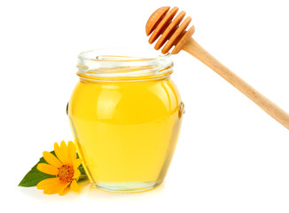 honey with honey dipper isolated on white background