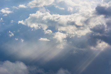 Sunrays bursting through clouds 