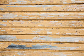 Background of old yellow painted wooden boards