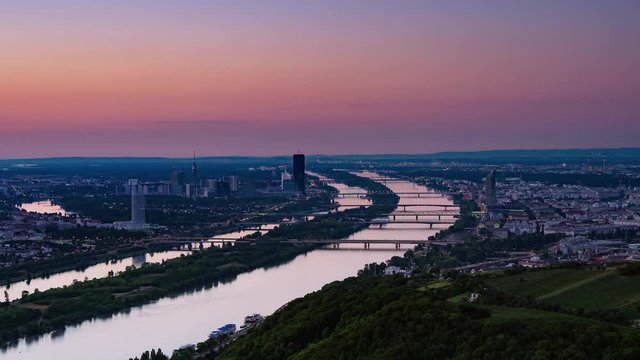 vienna cityscape timelapse sun lighting up the city
