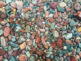 Colorful stones underwater in lake