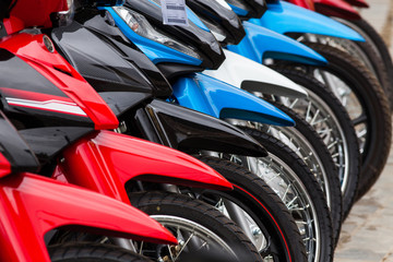 row of new motorbikes for sale