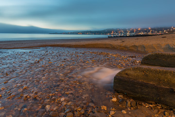 stream running into sea in Swanage Bay
