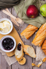 French baguette with butter and jam for breakfast