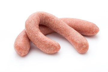 Raw sausages with herbs and spices.