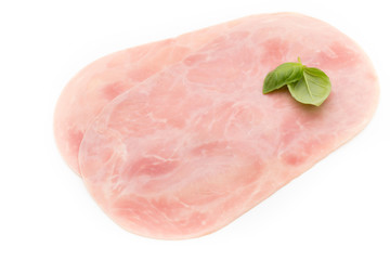 Thin slices of ham on white background.
