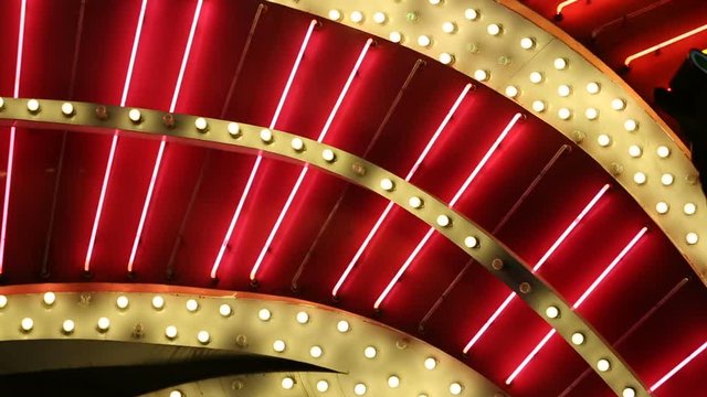 Red Neon Tube Lights and Bulbs Blink Detail. detail of a Las Vegas Casino neon lights and blinking bulbs
