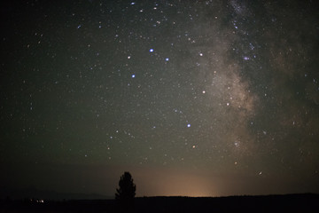 Obraz na płótnie Canvas Night photography of milky way galaxy stars over north America from Grand Tetons National Park