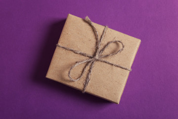 Packaged gift on a purple background
