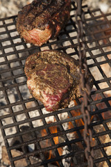 Grilled beef steak on wood plate