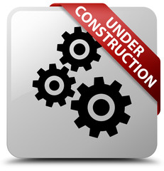 Under construction (gears icon) white square button red ribbon in corner