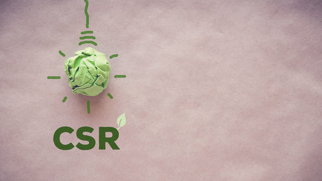 Green paper light bulb with CSR, Corporate social responsibility