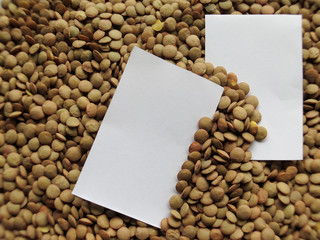 Closeup of White tag on raw lentils background