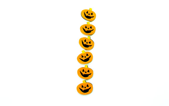 border row of 6 pumpkin jack-o-lantern characters isolated on white