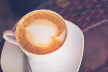 a cup of Capuchino coffee