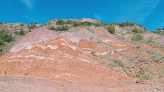 Palo Duro canyon, Texas state park. August, 2017. POV. point view of canyon wall, different rock layers on the hill.