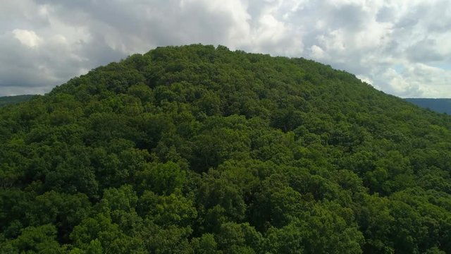Drone flying up a mountain 4k 60p