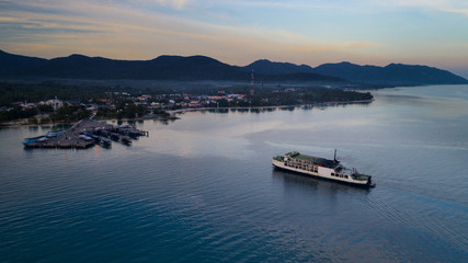 Fototapeta premium Sunset aerial view of Koh Phangan international port 