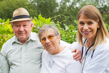 Medical doctor with elderly couple