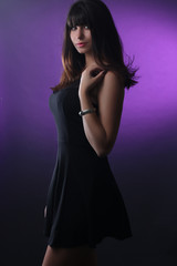 young beautiful stylish woman in black dress