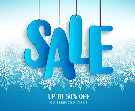 Winter sale vector banner design with hanging sale text in white winter snowflakes in blue background for retail marketing promotion. Vector illustration.
