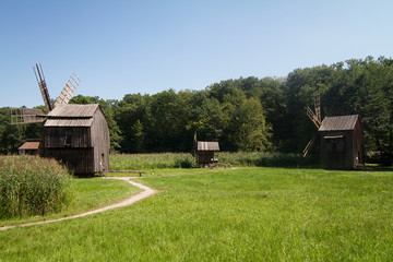 Fototapeta na wymiar old wooden windmill