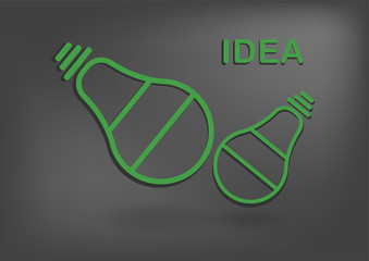 Green bulb light icon on black background.