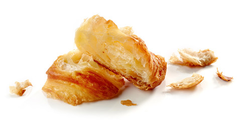 Croissant pieces and crumbs