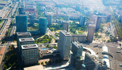 Fototapeta na wymiar Modern neighbourhoods of Barcelona in Spain, aerial view