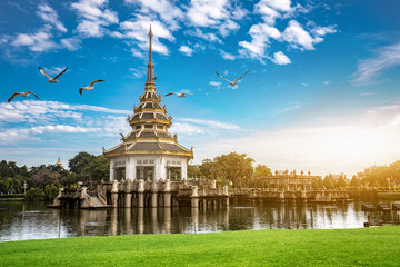 Naklejka premium pavilion temple in swamp the morning time in the garden