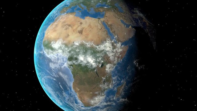 Night to day - rotating Earth. Zoom in on Cameroon outlined