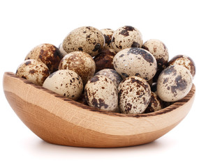 Obraz premium quail eggs in wooden bowl isolated on white background cutout
