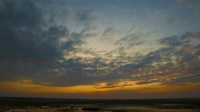 Sky clouds sunset over lake background, 4k timelapse