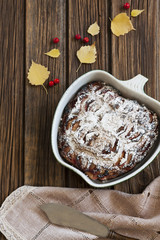 Apple pie on rustic wooden background. Autumn content, space for your text