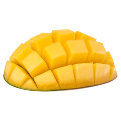 Sliced mango cubes isolated on white background
