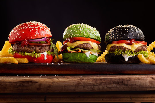 Three, Hamburgers On Colorful Bred Buns