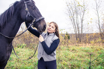 Obraz premium Girl and horse