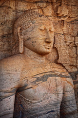 Fototapeta na wymiar Polonnaruwa, Sri Lanka. Close-up shot Gal Vihara Buddhist statue