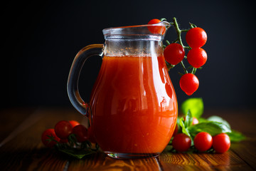 Homemade natural tomato juice in a decanter