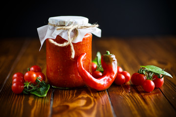 Homemade organic tomato sauce in a glass jar
