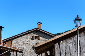 Fototapeta na wymiar Typical Houses and churches of the mountain village of Sauris