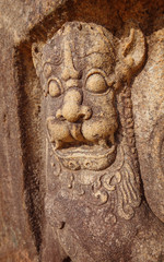 Fototapeta na wymiar Intricate Stone Relief Sculpture at a Temple in Anuradhapura