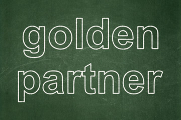 Business concept: Golden Partner on chalkboard background