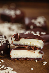 Cut handmade chocolate candies with sesame seeds