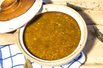 bowl of black and red lentil on wood background
