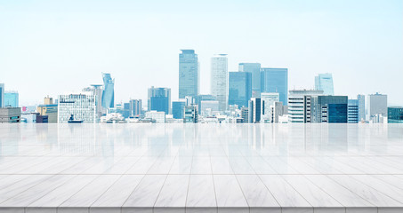 Business concept - Empty marble floor top with panoramic modern cityscape building bird eye aerial...