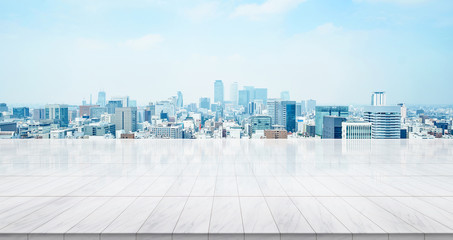 Business concept - Empty marble floor top with panoramic modern cityscape building bird eye aerial...